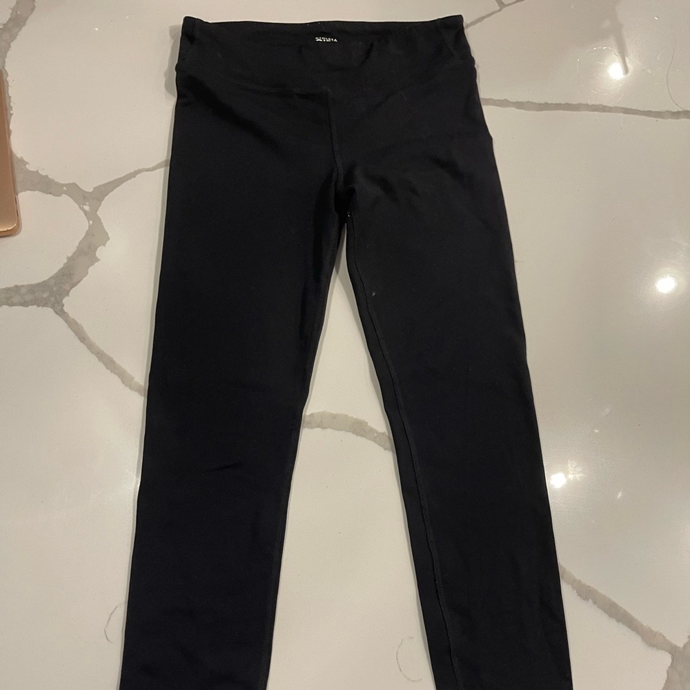 Black athleta girls leggings size 16. Logo is missing part but store can replace